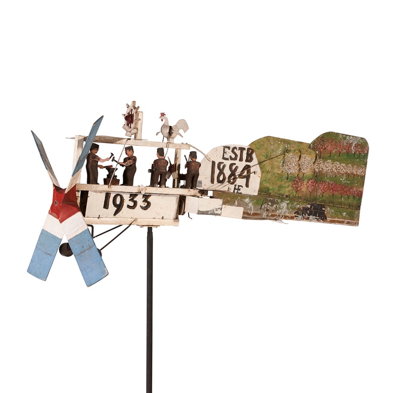 A painted sheet iron and wood ‘airplane windmill’ with blacksmith shop automaton, initialed by Henry Engelhardt, 1933. Height 24½ in (62.2 cm) high; width 47 in (119.3 cm); depth 24½ in (62.2 cm). Estimate $8,000-12,000. Offered in Important Americana on 20 January at Christie’s New York