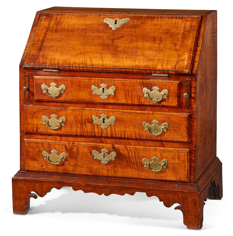 A Chippendale figured maple child’s slant front desk, attributed to John Chipman (1746-1819), c. 1770-1790. Closed 22¾ in (57.7 cm) high; 20¼ in (51.4 cm) wide; 12¾ in (32.3 cm) deep. Sold for $126,000 in Important Americana on 20 January at Christie’s New York
