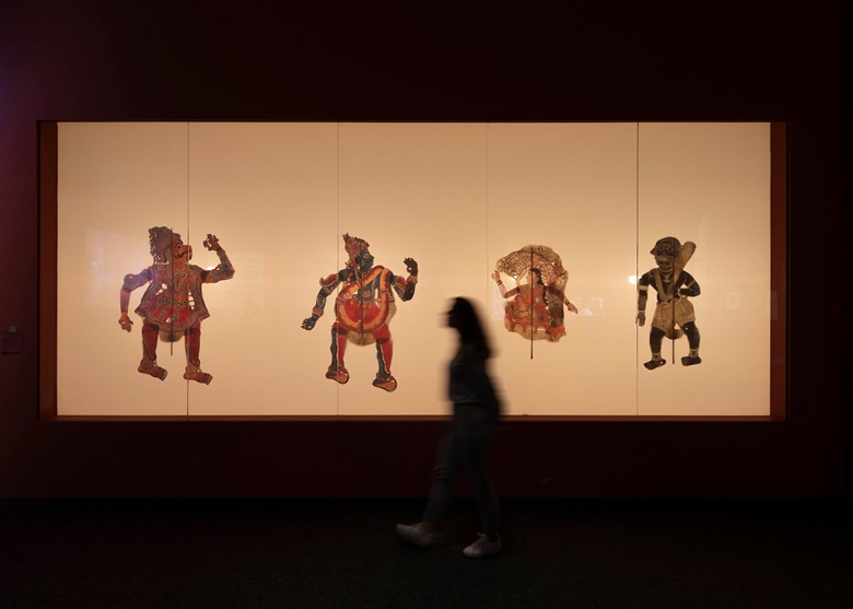 Installation view of shadow puppets from Andhra Pradesh, India, dating from the first half of the 20th century, representing characters from the epic poem the Ramayana. Paris, Musée du Quai Branly-Jacques Chirac. Photo Ismail NoorSeeing Things. © Department of Culture and Tourism, Abu Dhabi