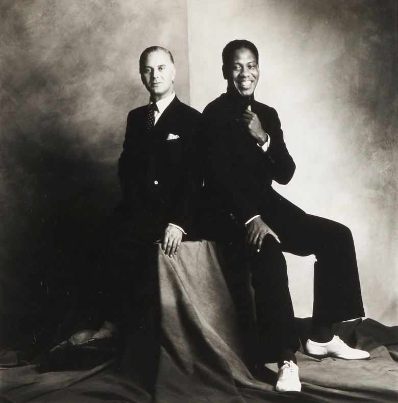 Lord Snowdon (1930-2017), André Leon Talley with Manolo Blahnik. Gelatin silver print. 10 ½ x 10 ½ in. Estimate $1,200-1,800. Offered in The Collection of André Leon Talley on 15 February 2023 at Christie’s in New York