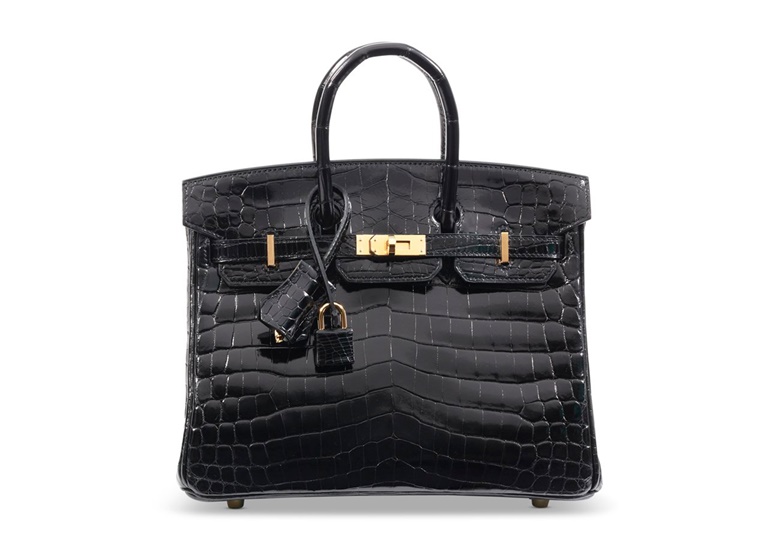A shiny black Niloticus Crocodile Birkin 25 with gold hardware, Hermès, 2020. Available to purchase immediately. Price on request