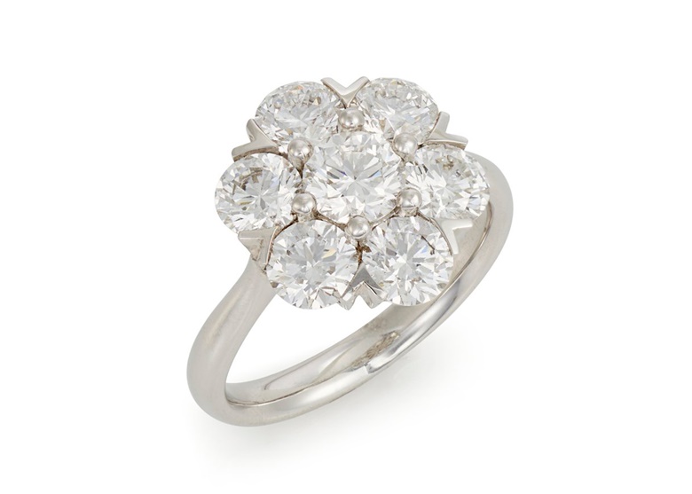 A diamond cluster ring. Circular-cut diamonds, gold, US ring size 6½. Available to purchase immediately. Price on request