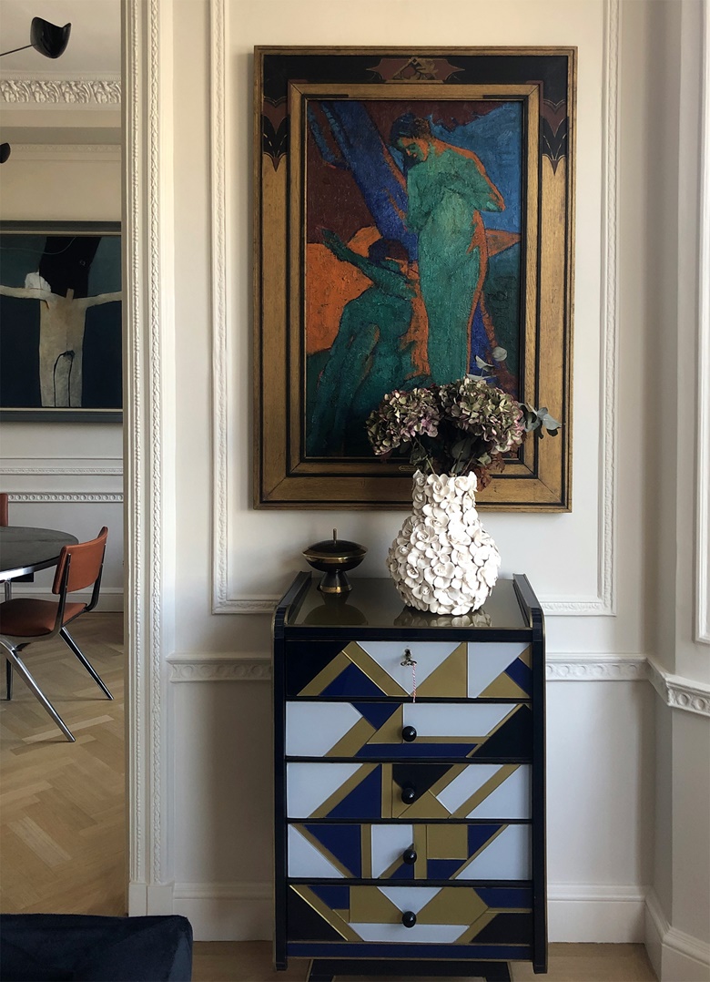 The private collection of a CURA Art client in London showing Nudes in a Red Light (Adam and Eve), circa 1913, by Alfred Aaron Wolmark and a partial view of Bird-Man, 1972, by Keith Vaughan. Photo courtesy of CURA Art. Artworks © Estate of Alfred Aaron Wolmark. All rights reserved, DACS 2023. © The Estate of Keith Vaughan. All rights reserved, DACS 2023