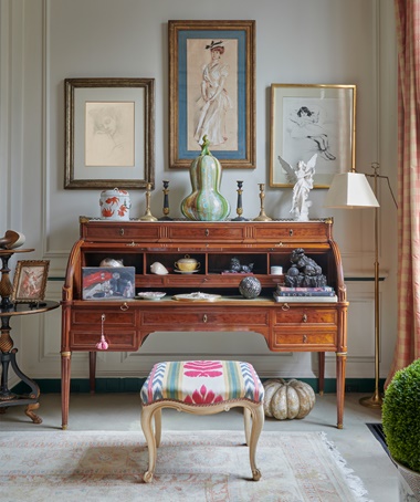 A Louis XVI ormolu-mounted bureau à cylindre, circa 1790 (£7,000-10,000). Among the works hung above is Katia endormie, circa 1974, by Balthus (£20,000-30,000). Offered in The Robin and Rupert Hambro Collection on 8 June 2023 at Christie’s in London