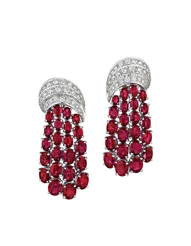 Right A Van Cleef & Arpels pair of ruby and diamond pendant earrings. Estimate $60,000-80,000. Offered in The Magnificent Jewels of Anne Eisenhower on 7 June 2023 at Christie’s in New York