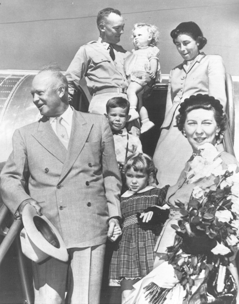 President Dwight D. Eisenhower and Mamie Eisenhower with their son, daughter-in-law and grandchildren, 1953. Anne Eisenhower holds her grandfathers hand. Photograph AP Wirephoto