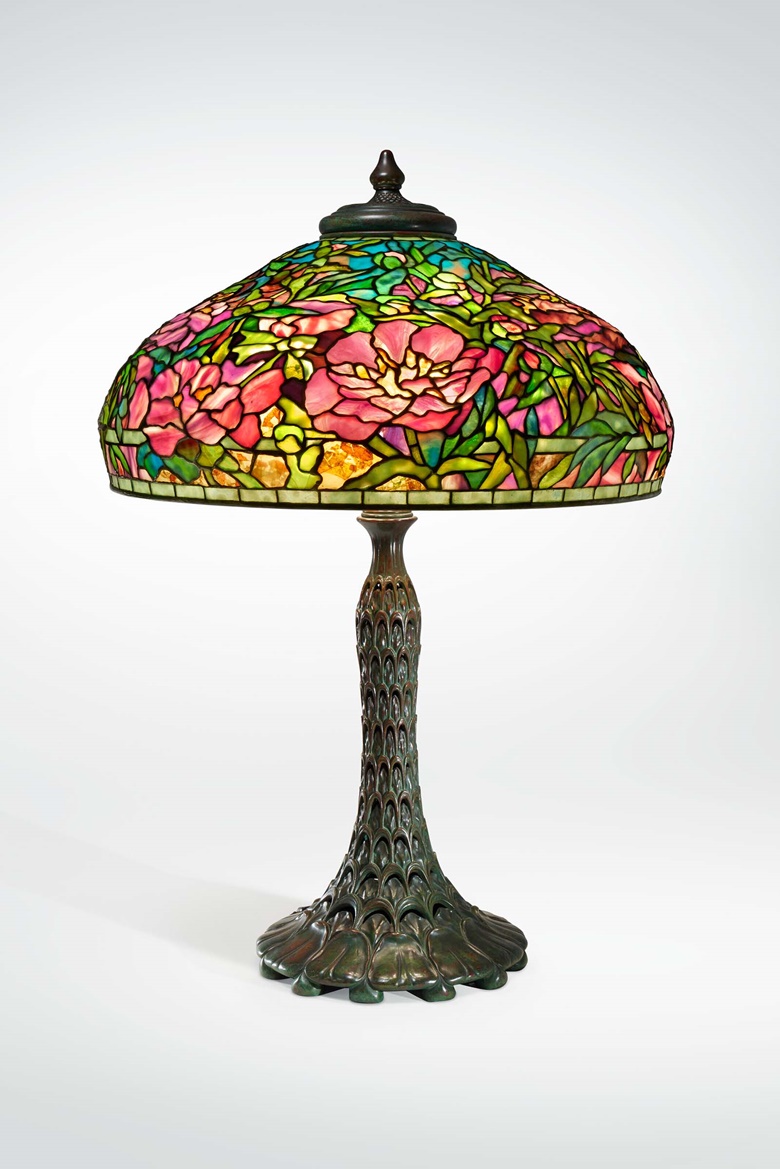 Tiffany Studios, ‘Elaborate Peony’ table lamp, c 1915. Leaded glass, patinated bronze. 32½ in (82.6 cm) high, 23 in (58.4 cm) diameter. Estimate $250,000-350,000. Offered in Design on 8 June 2023 at Christie’s in New York