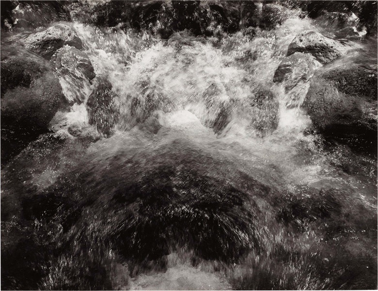 Ansel Adams (1902–1984), Cascade, Yosemite National Park, c. 1968. Gelatin silver print. Sheet 10⅛ x 13⅛ in (25.7 x 33.3 cm); mount 13⅞ x 17⅞ in (35.2 x 45.4 cm). Estimate $4,000-6,000. Offered in Photographs on 31 March- 13 April 2023 at Christie’s in New York