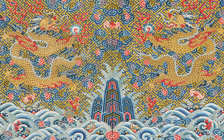 Detail of a magnificent imperial yellow kesi twelve-symbol dragon robe made for the emperor, longpao, Qianlong-Jiaxing period (1736-1820). 87½  x 57½ in (222.3 x 146.1 cm). Estimate