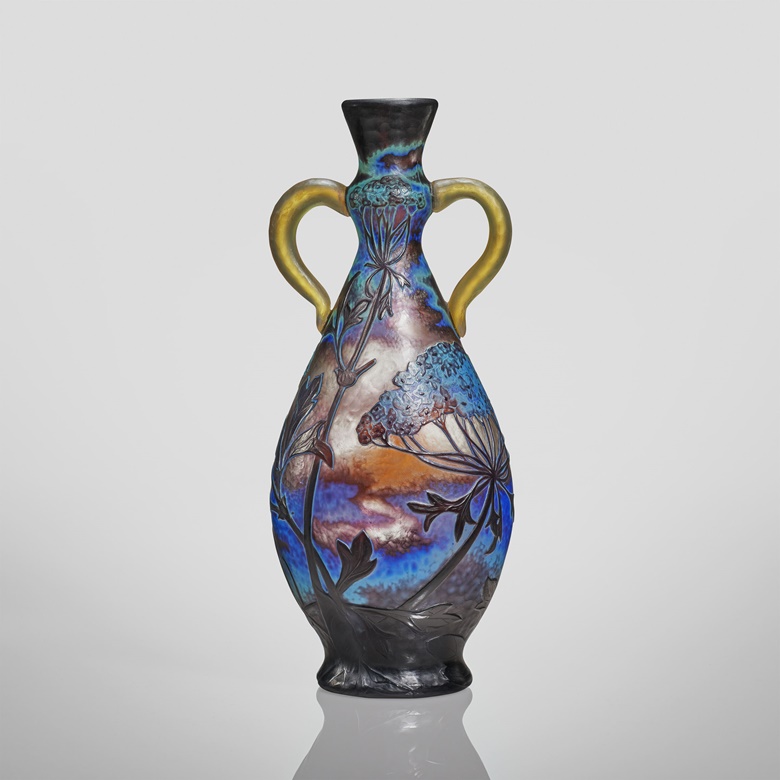 Daum, Ombelles Handled vase, c. 1903. 11½ x 5 x 4 in (29.2 x 12.7 x 10.2 cm). Estimate $5,000-7,000. Offered in Modern Collector Design and Tiffany Studios from 25 February to 11 March at Christies Online
