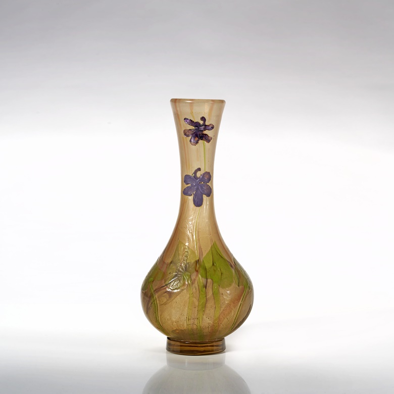 Émile Gallé, Vase Parlant aux Pervenches, c. 1990. 9 x 4¼ x 3 in (22.8 x 10.8 x 7.6 cm). Estimate $7,000-9,000. Offered in Modern Collector Design and Tiffany Studios from 25 February to 11 March at Christies Online