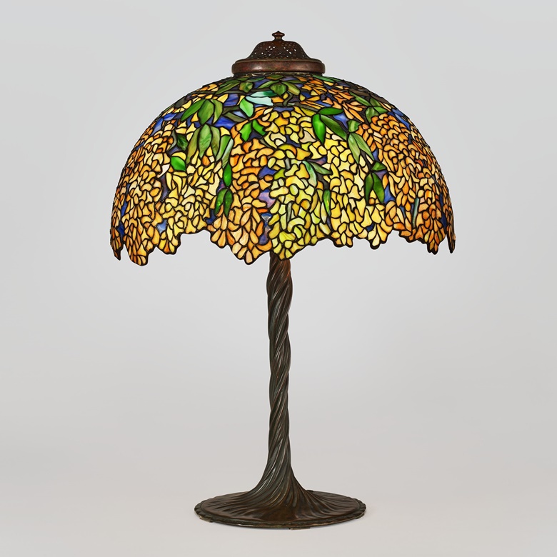 Tiffany Studios, Laburnum Table Lamp, c. 1918. 28½ in (72.4 cm) high, 21½ in (54.6 cm) diameter of shade. Estimate $50,000-70,000. Offered in Modern Collector Design and Tiffany Studios from 25 February to 11 March at Christies Online