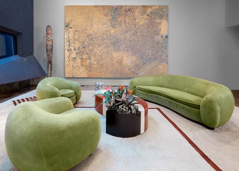 Jean Royère (1902-1981), ‘Ours Polaire’ sofa and pair of armchairs, c. 1952. Sofa 30⅝ x 94 x 54¼ in (77.8 x 238.8 x 137.8 cm), each armchair 27½ x 38½ x 37¾ in (69.9 x 97.8 x 95.9 cm). Painted wood, original Mohair fabric upholstery. Estimate $1,000,000-1,500,000. Background Rudolf Stingel (b. 1956), Untitled, 2010. 130 x 185