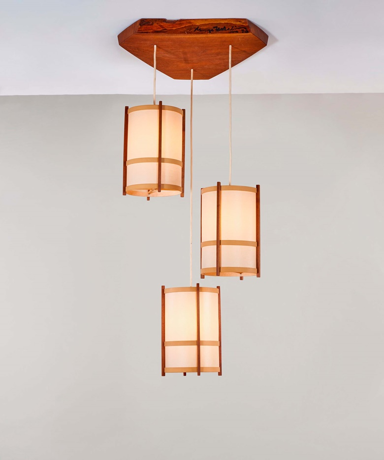 George Nakashima (1905-1990), Custom Chandelier, 1978. American black walnut, parchment, beech. 38 in (96.5 cm) drop, 24⅜ in (61.9 cm) wide, 22½ in (57.2 cm) deep. Estimate $25,000-35,000. Offered in Art of Collecting A Pacific Island Connoisseur of Art and Design on 7 March 2023 at Christie’s New York