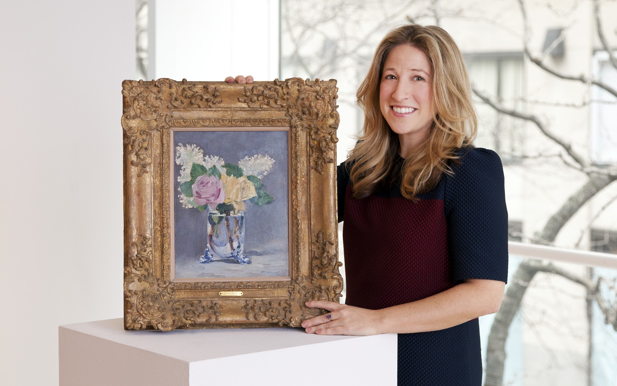 Jessica Fertig, Christie’s Senior Vice President in Impressionist and Modern Art, with Edouard Manet’s Lilas et roses