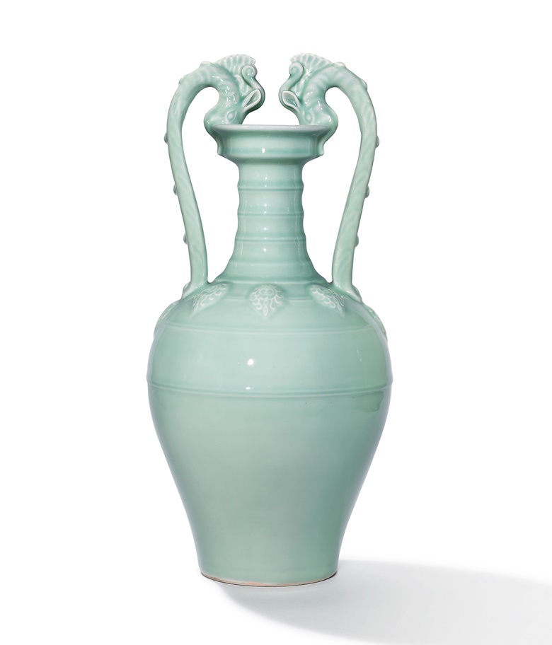 An Exceptional Fine Tang-style Double-Dragon Celadon-Glazed Amphora Yongzheng Six-character Seal Mark in Underglaze Blue and of the Period (1723-1735). 51.8 cm (20 38 in) high. Sold for HK$140,540,000  $18,129,688 in The Yongzheng Emperor’s Double-Dragon Amphora on  31 May at Christie’s in Hong Kong